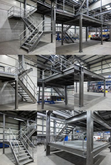 Steel staircase arrangement in a spacious industrial setting with multiple levels.