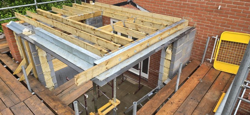 Galvanised steel beams supporting a timber roof frame on an extension, Norfolk