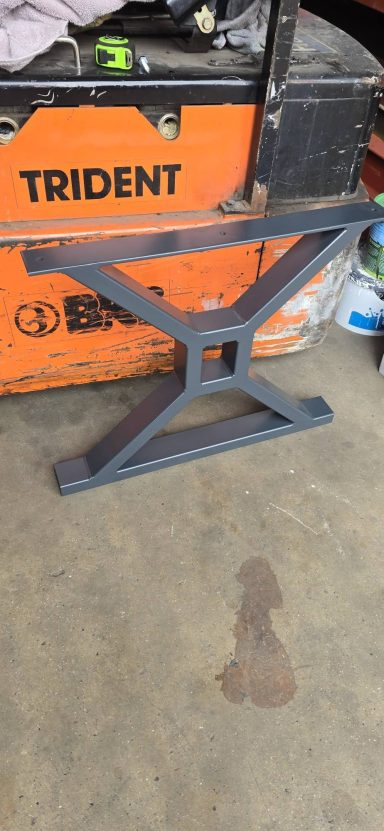 Black steel X-frame table leg fabricated in our workshop, Norwich